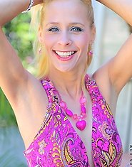Anilos Payton Leigh pulls up her elegant dress to reveal her tiny thong